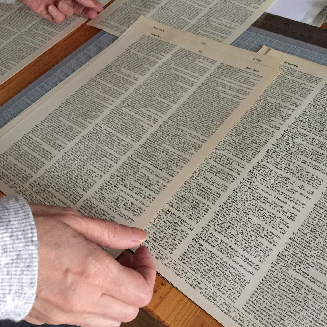 Book pages sorted before printing in Antwerp studio